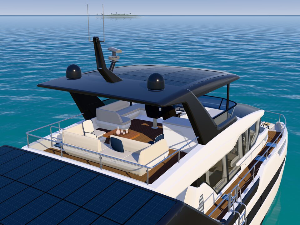 The flybridge from above: the lounge and table under the solar roof, the helm beside it.